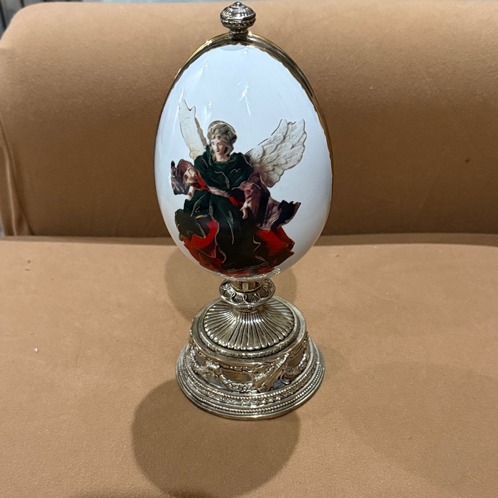 Decorative Egg with Angel that rotates and sings hark the Harold angels sing